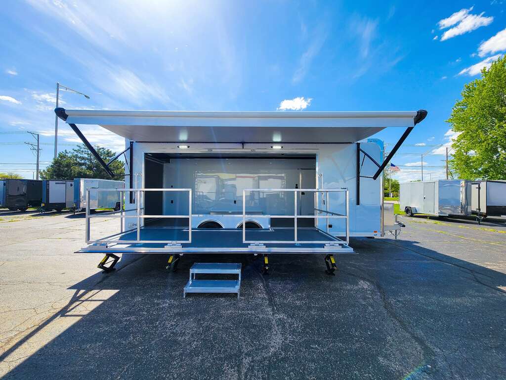 White ATC stage trailer